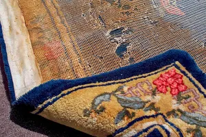 Отслаивание вторичной подложки у ковра